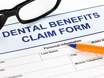 A closeup of a dental benefits claim form